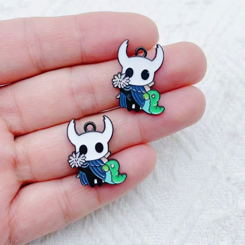 10pcs alloy drip oil cartoon a - Party Games Questions 评论和价格